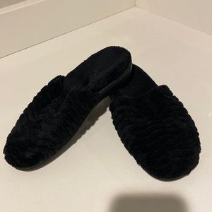 Acorn black slippers.  Size 6.5 to 7.5.   Classic black slip on